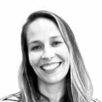 Angela is smiling and has long blond hair